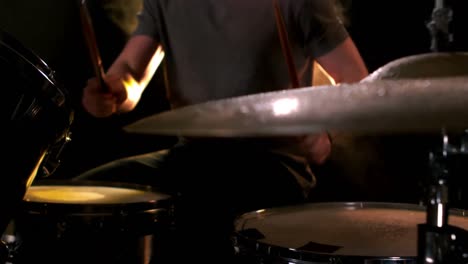 a man playing the drums