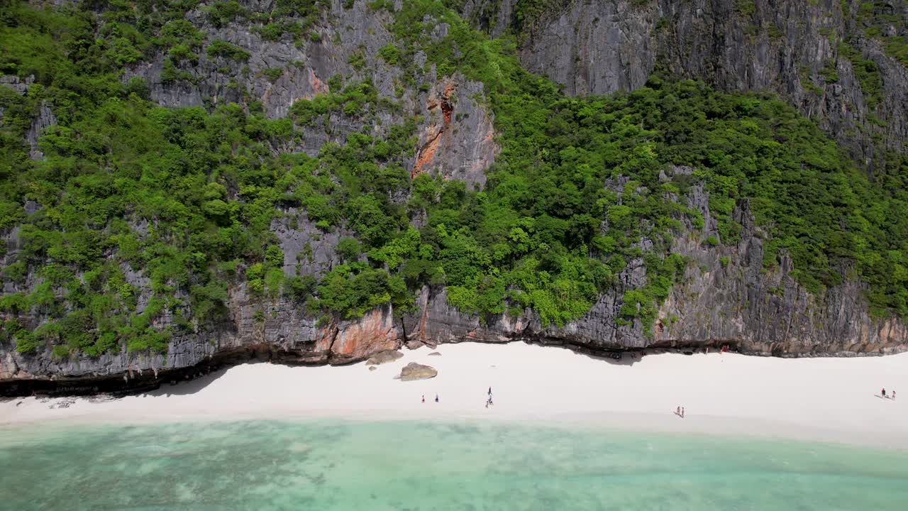 Aerial closeup shot of Phi Phi Leh with Maya Bay, Krabi province, Thailand. Aerial top view of amazing tropical island with turquoise water and white beach, famous travel destination.