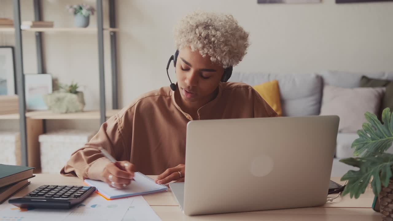 Afro female operator wear headset having work in customer service support