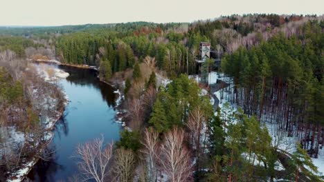 Aerial-View-of-Anyksciai-Laju-Takas,-Treetop-Walking-Path-Complex-With-a-Walkway,-an-Information-Center-and-Observation-Tower,-Located-in-Anyksciai,-Lithuania-near-Sventoji-River