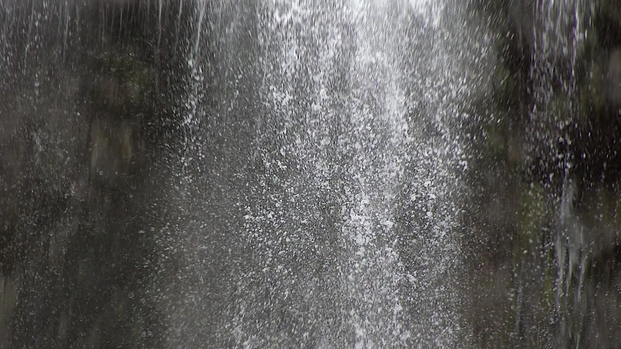 Close-up of Water Cascading Down a Rocky Cliffside