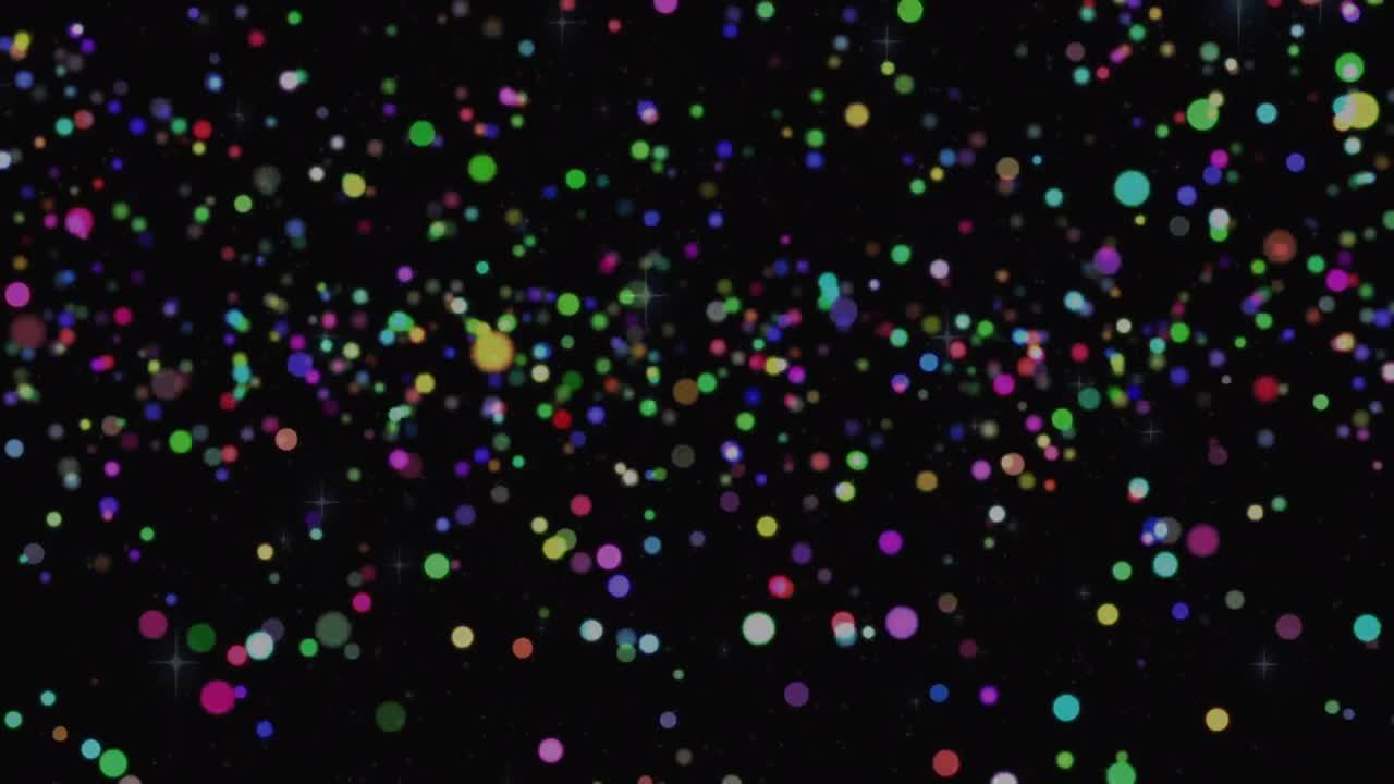 Animation of glowing multi coloured spots over black background