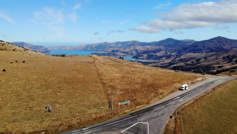 Travel-Van-life-New-Zealand-mountains-and-lake-Drone-following-4k