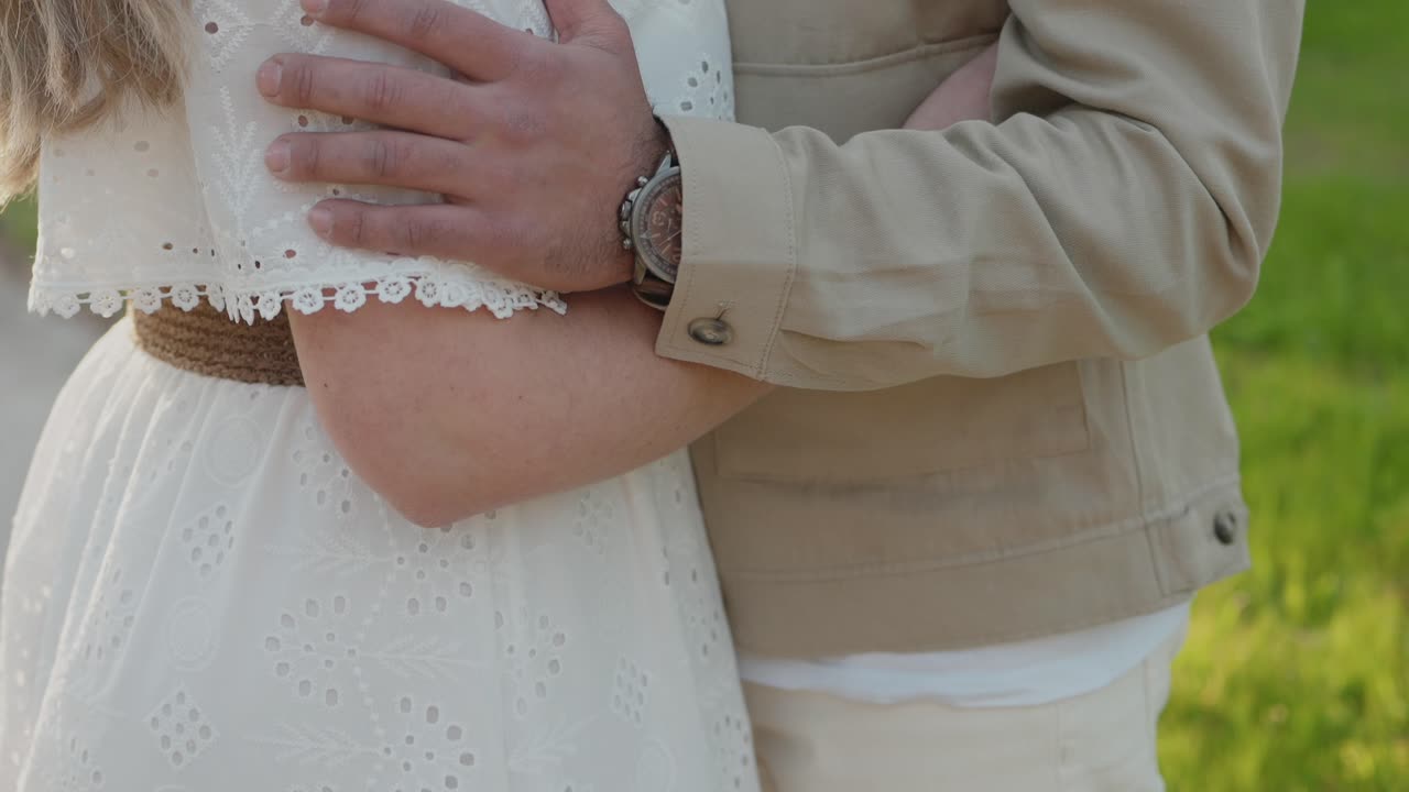 close up of couple holding each other tenderly in soft natural light