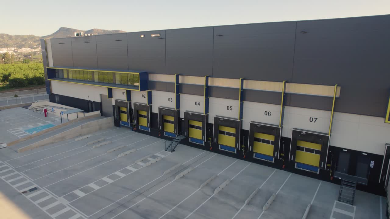 Warehouse Distribution Center Docking Area with Trucks