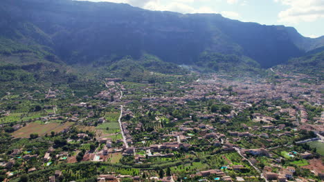 aerial, panoramic view of soller town in mallorca, spain, with hills and valleys