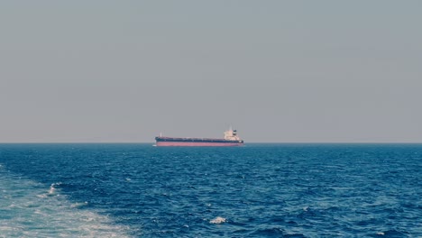 Merchant-ship-sailing---view-from-another-vessel