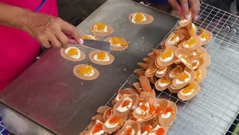 thai street food: preparing khanomuang