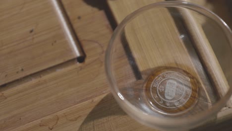 small glass tea cup on a tea tray