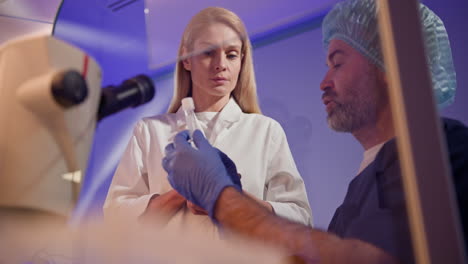 scientists collaborating in a laboratory setting