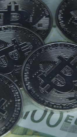 cryptocurrency coins lying on the euro banknotes