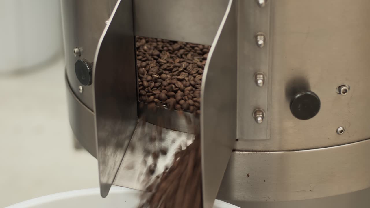 Coffee beans coming our of a Loring Coffee Roaster