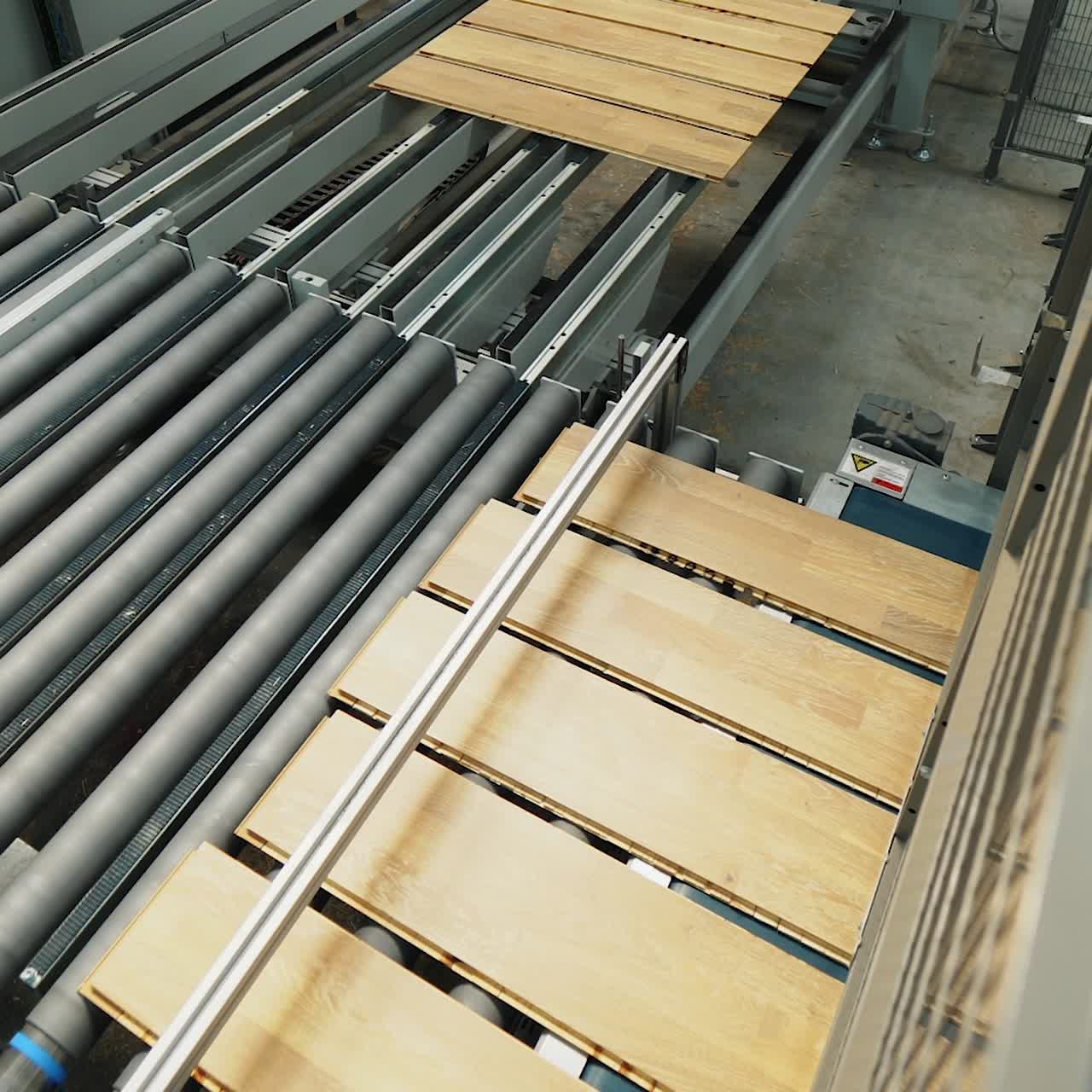 parquet board are processed on the production line in the woodworking plant. Modern production technologies