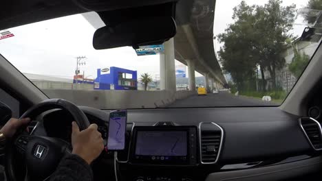 Driver's view navigating the Viaducto Tlalpan highway leaving Mexico City, timelapse