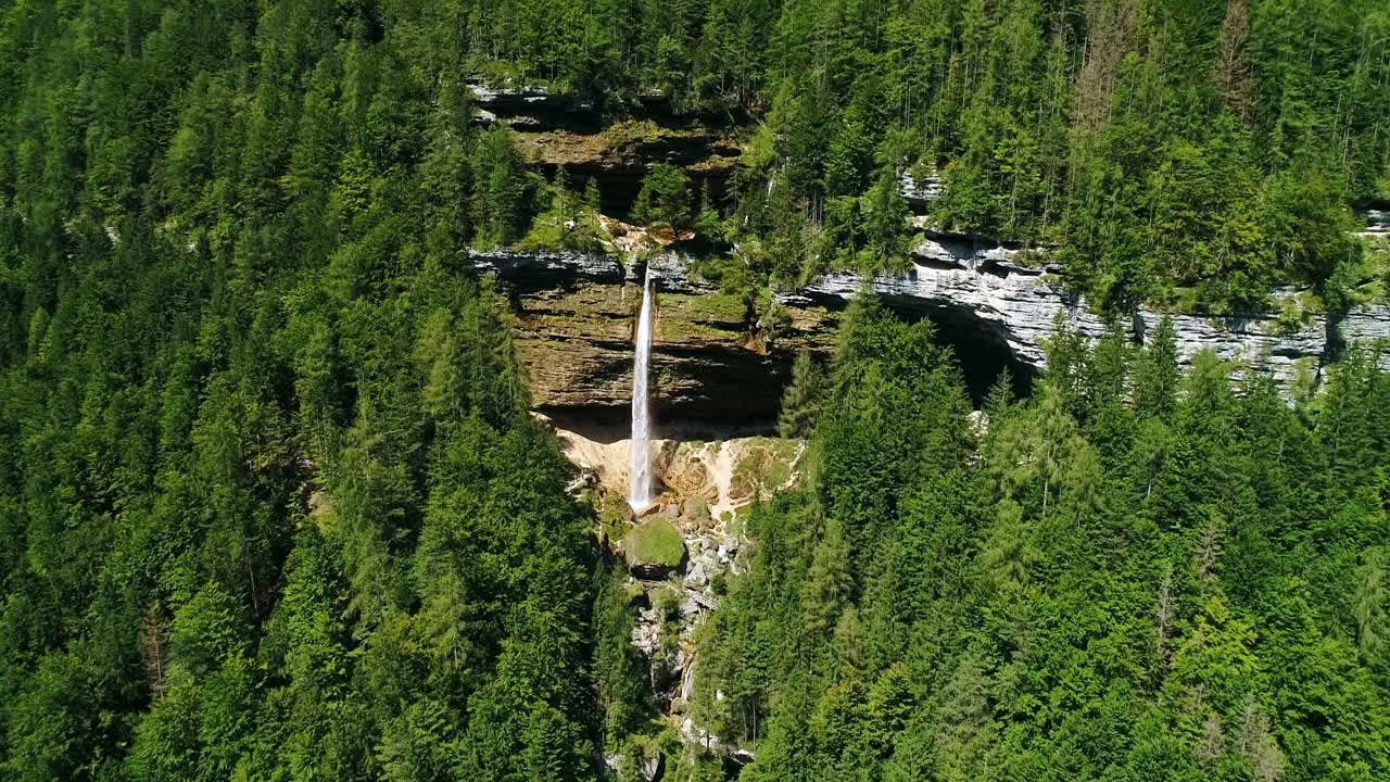 Slap Peričnik - picturesque Slovenian waterfall, vibrant summer greens, drone