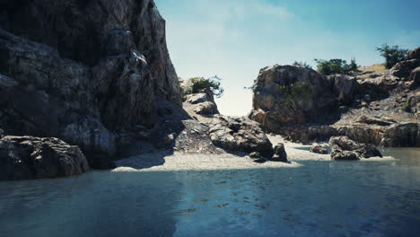 coastal-view-of-a-sand-beach-with-cliffs