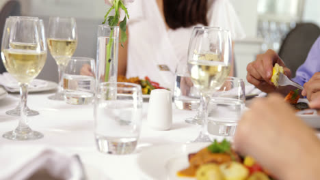 group of friends eating dinner together