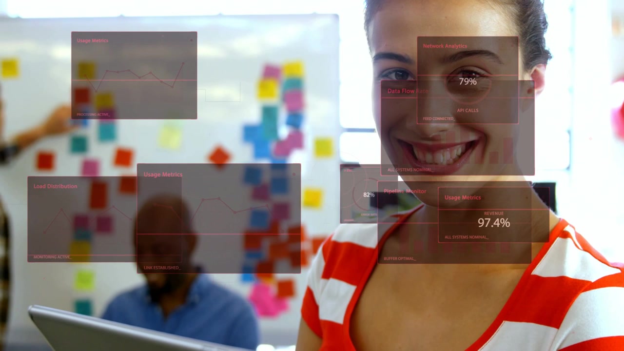 Woman tapping tablet causing faint overlays to spread for business metrics while peer adding notes