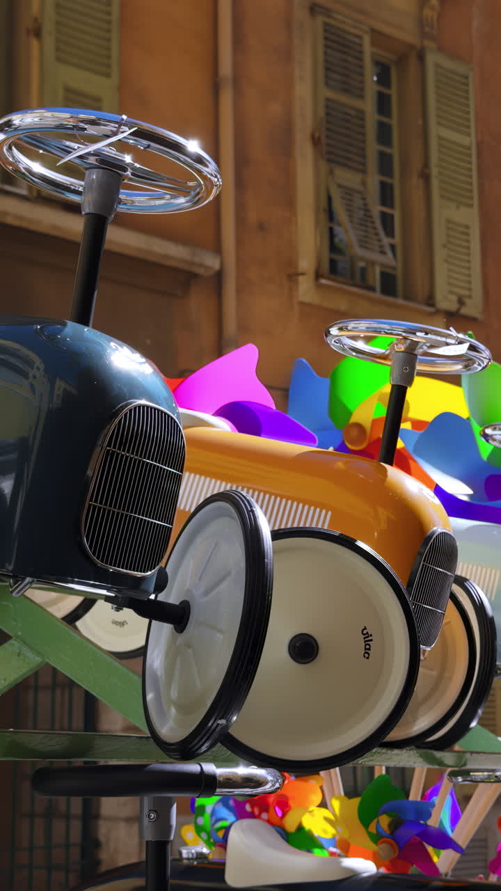 Vintage Style Children's Push Cars on Display