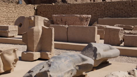 ancient stone ruins and carved sculptures at the dendera temple complex