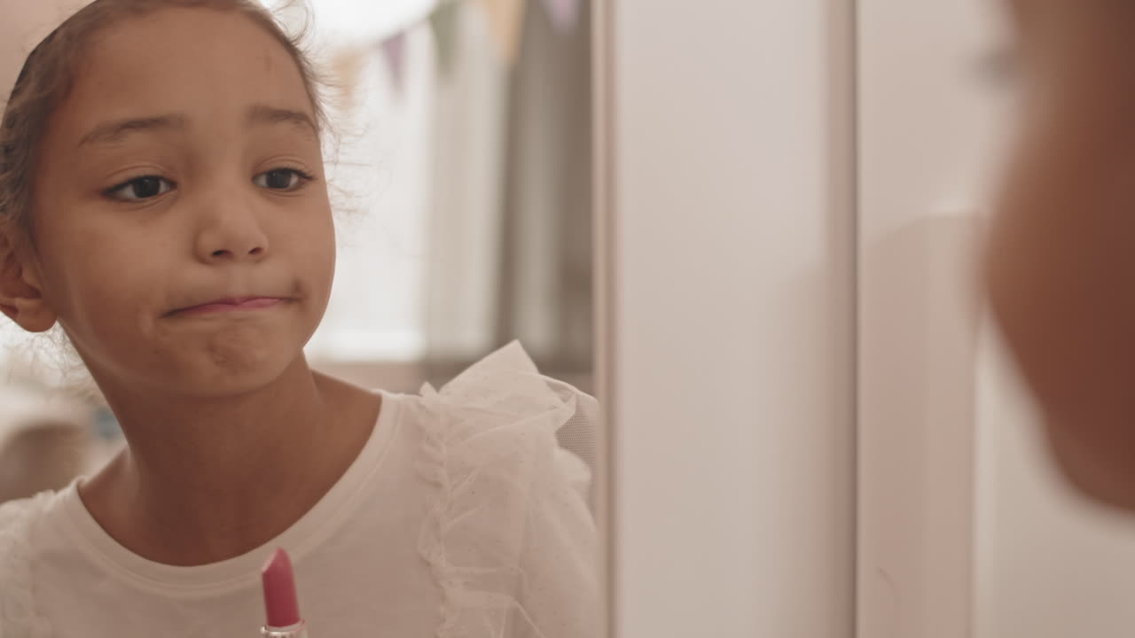 Girl Using Lipstick and Having Fun