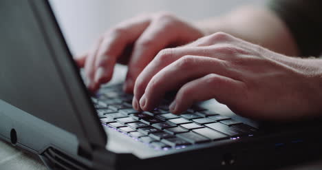 Business-Businessman-Hands-Type-On-Laptop-Computer-Close-Up-