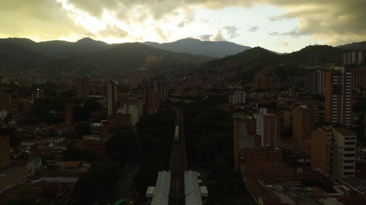 Train Arriving at Metro Station During Golden Hour in Colombian City of Medellin