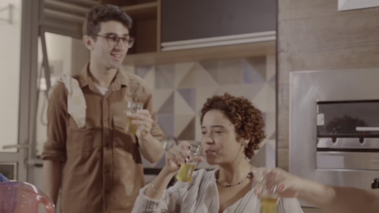 Friends Toasting and Socializing at Home