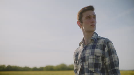 young man in a field