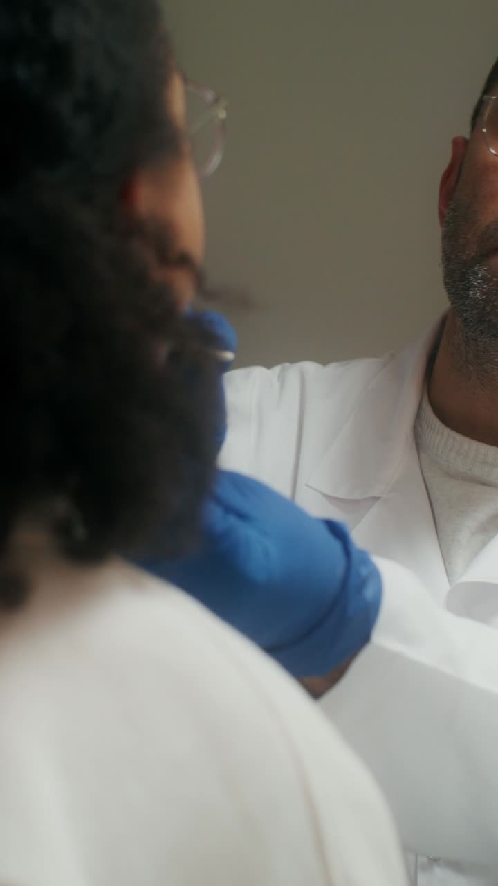 Doctor examining a patient