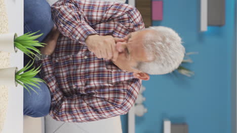 Vertical-video-of-Man-with-nausea.