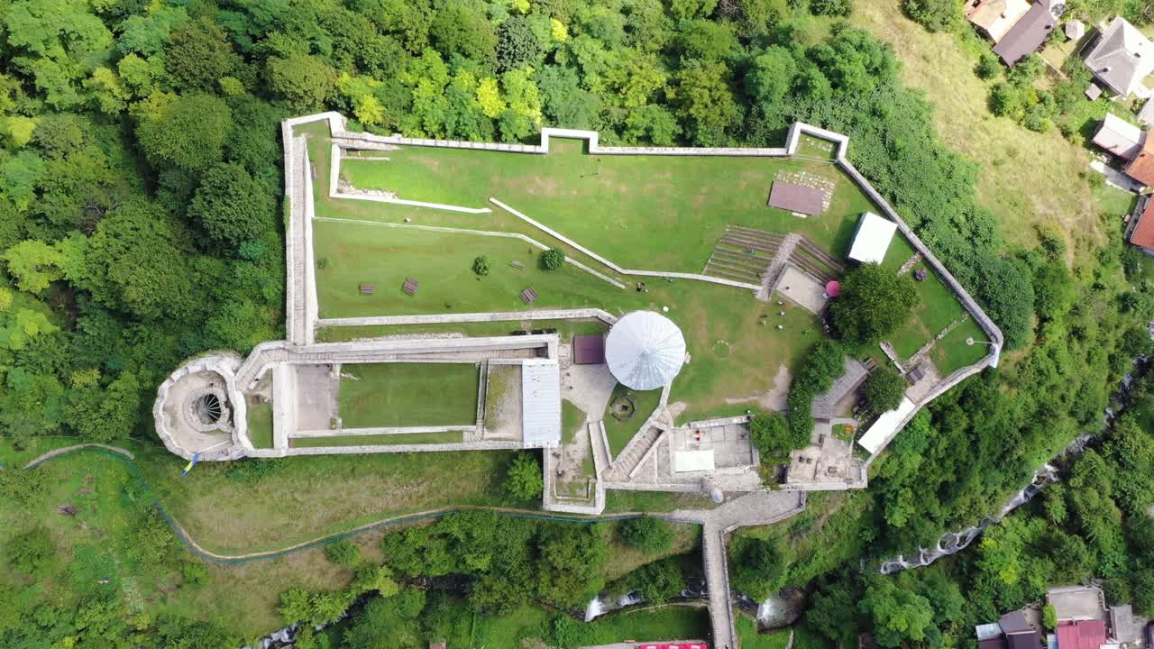 Aerial dolly in of Travnik castle in Bosnia. Top down view