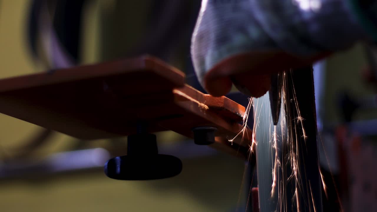 beautiful sparks from metal sanding showing  red trails