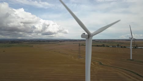 Aerial-orbit-shot-of-wind-turbine-in-operation