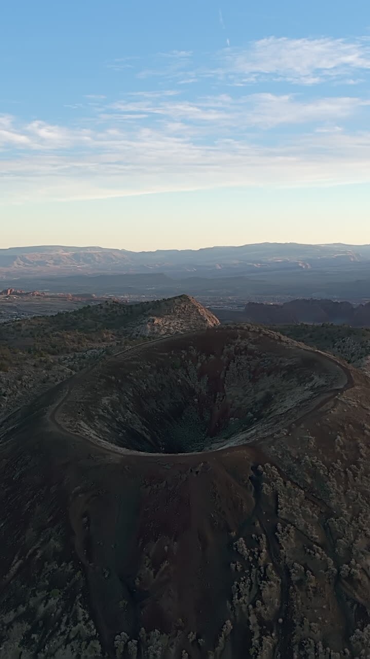 Diamond Valley Cinder Cone With Trail Around Its Crater In The Santa Clara Volcanic Field, Utah, USA. - aerial vertical shot