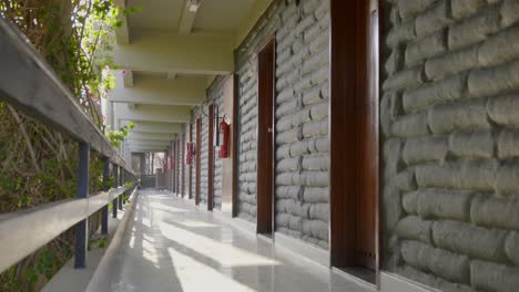 Static-Shot-Of-Long-Corridor-In-Front-Of-Apartments-Doors-In-Building