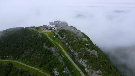 Flying-through-clouds-towards-Jay-Peak,-Vermont