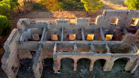 bird's eye view of the abandoned monastery of carmona, seville with sidelight at sunset