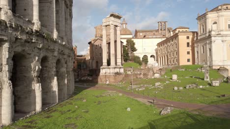 Walking-along-theatre-of-Marcellus,-an-ancient-monument-located-in-Rome,-capital-in-Italy