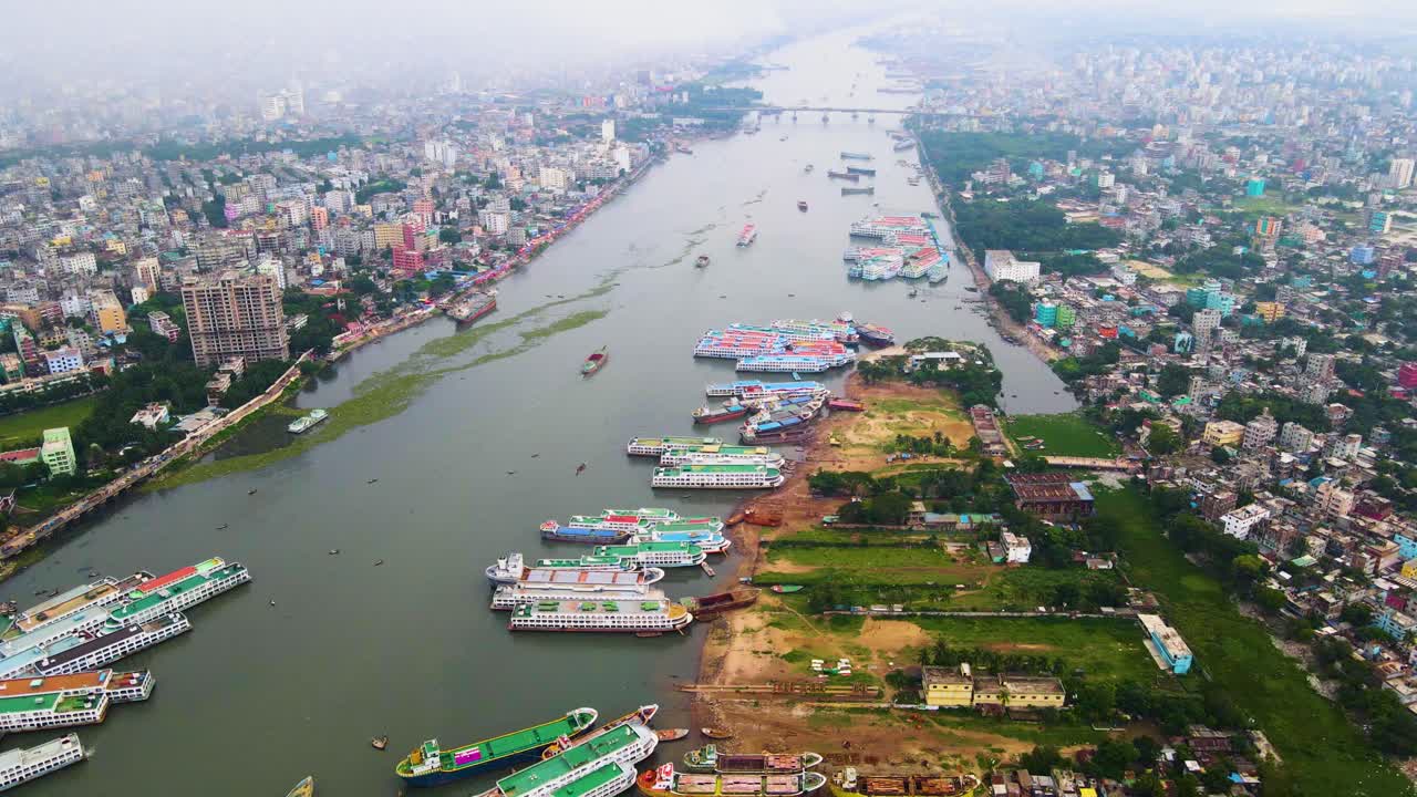 Aerial: Ships docked along Buriganga River in Dhaka city, Bangladesh