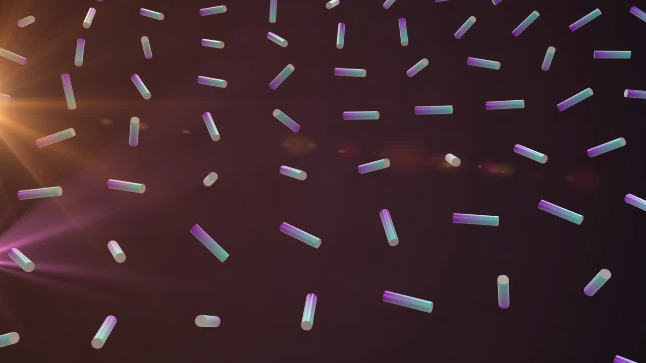 검은색 배경에 빛의 흔적과 반점 위에 다채로운 모양의 애니메이션