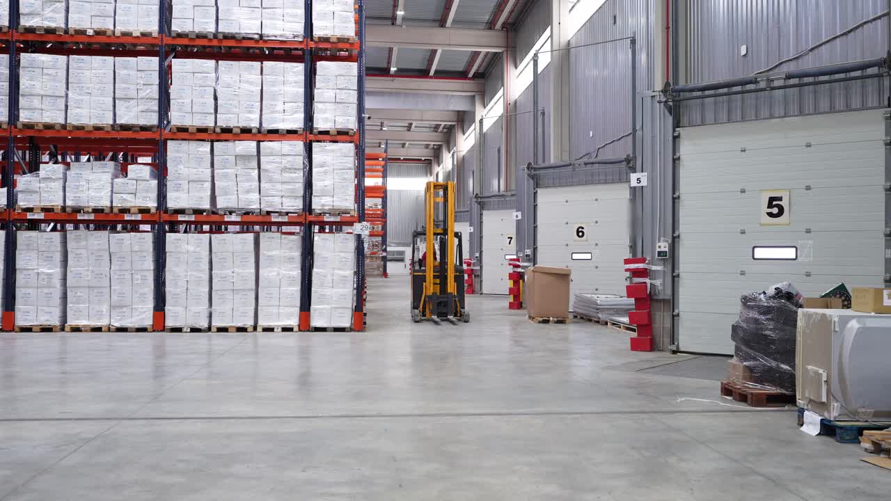 Warehouse interior with forklift and storage shelves