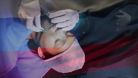 animation of flag of russia waving over anesthesiologist in operating theatre