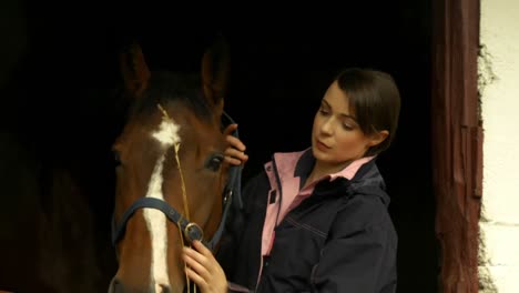 Pretty-brunette-with-her-horse