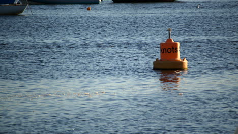 wide-shot-of-orange-river-buoy-at-Lymington-river