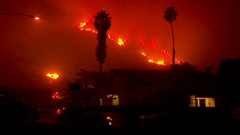 the thomas fire burns at night in the hills above the 101 freeway near ventura and santa barbara california 4