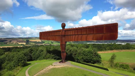 Wide-45-degree-view-and-flyover-of-the-Angel-of-the-North-statue,-Newcastle,-Northumberland,-UK