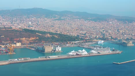 aerial images from the window of the plane arriving at el prat airport flight over the port of barcelona-2