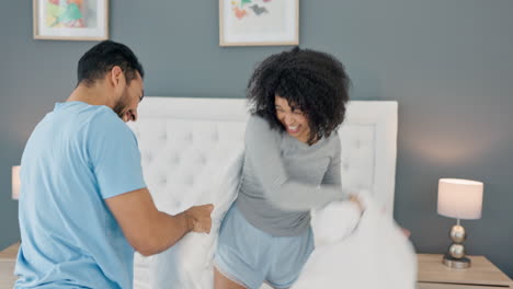 Love,-pillow-fight-and-couple-with-a-man