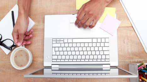 Overhead-of-man-working-at-desk